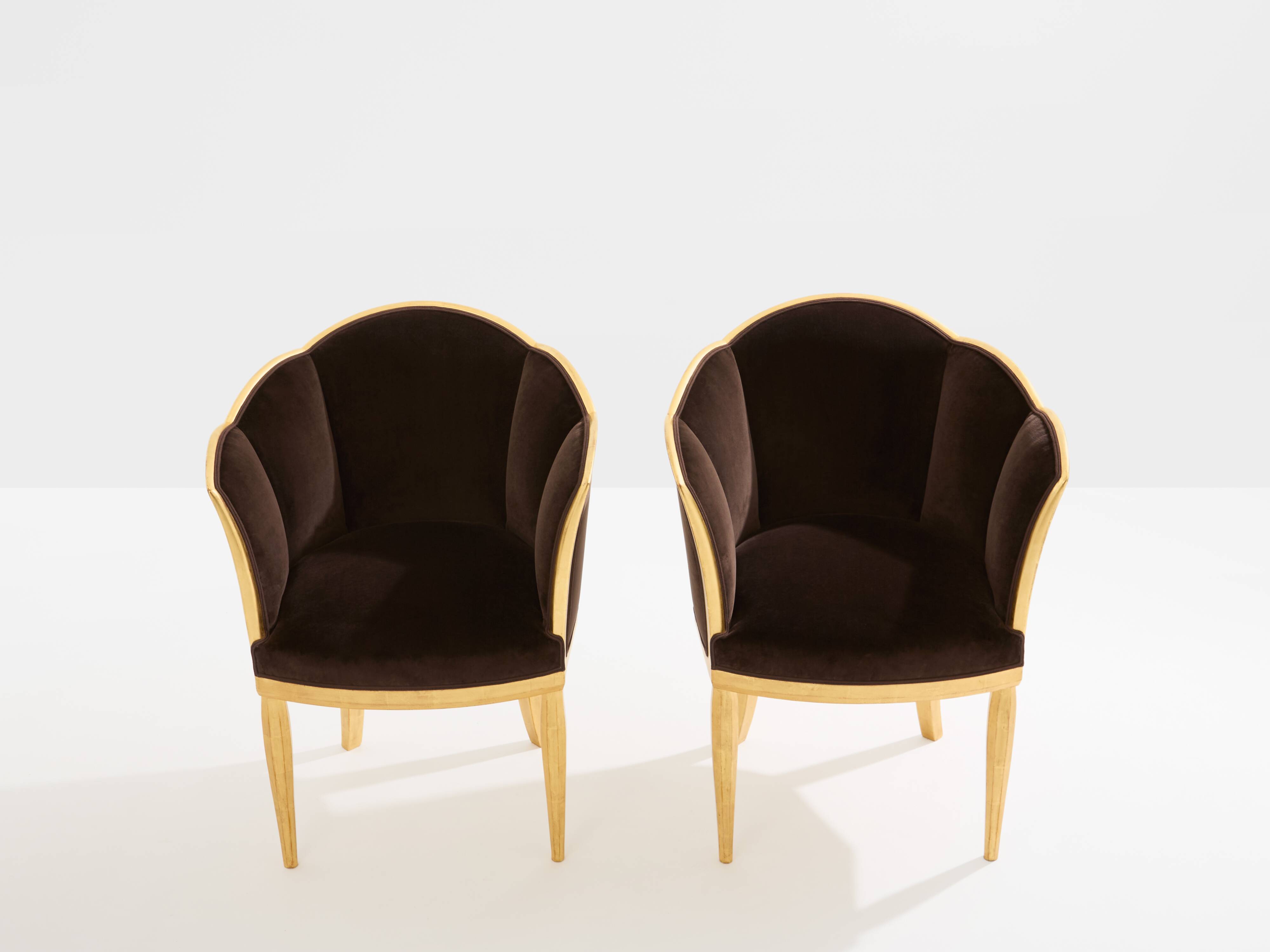 Maurice Dufrène pair of armchairs, gilded wood, brown velvet, 1925.