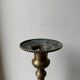 Gilded bronze candlestick with cherub trio decoration