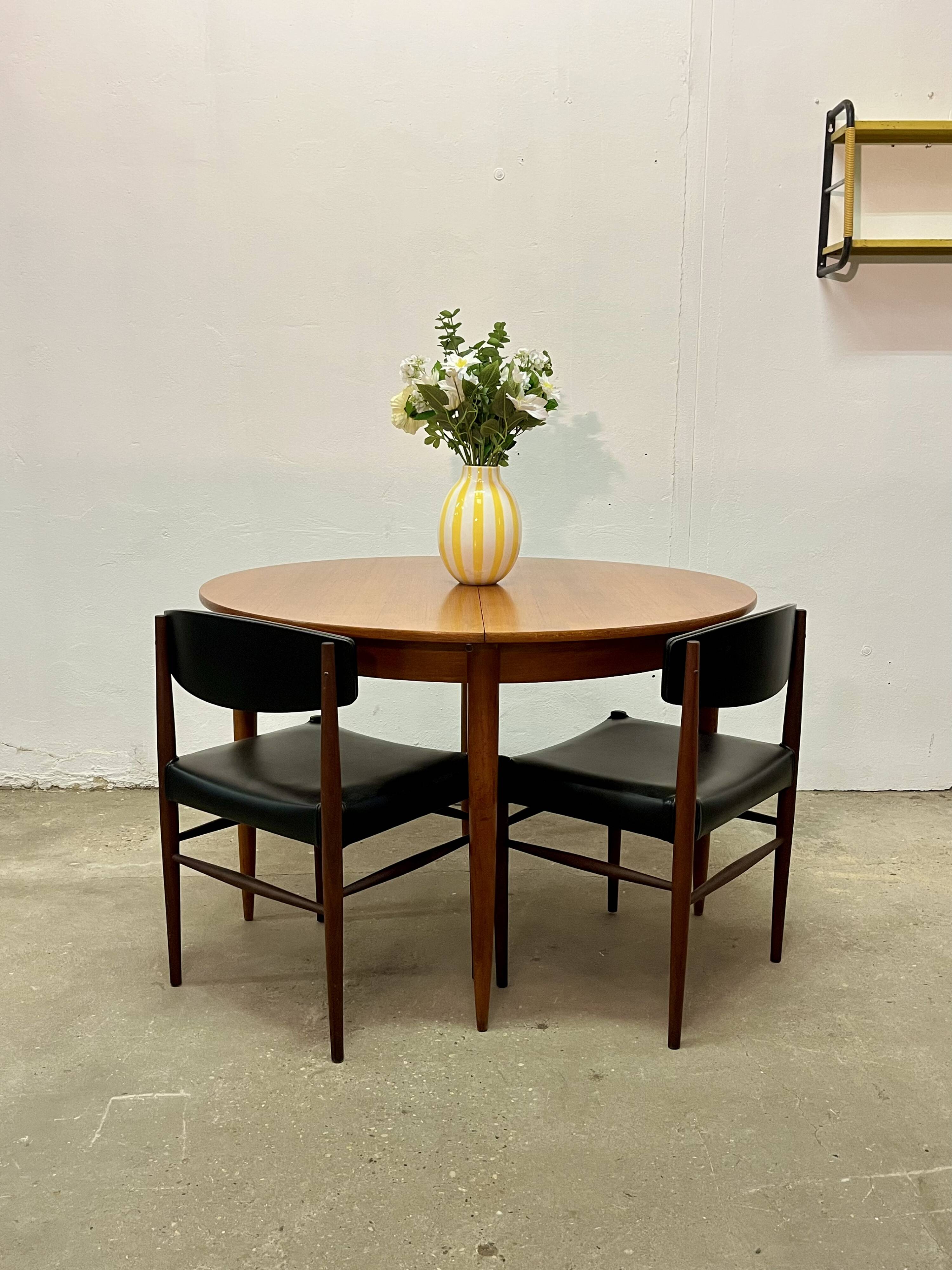 Vintage 1960s teak extendable Scandinavian table.