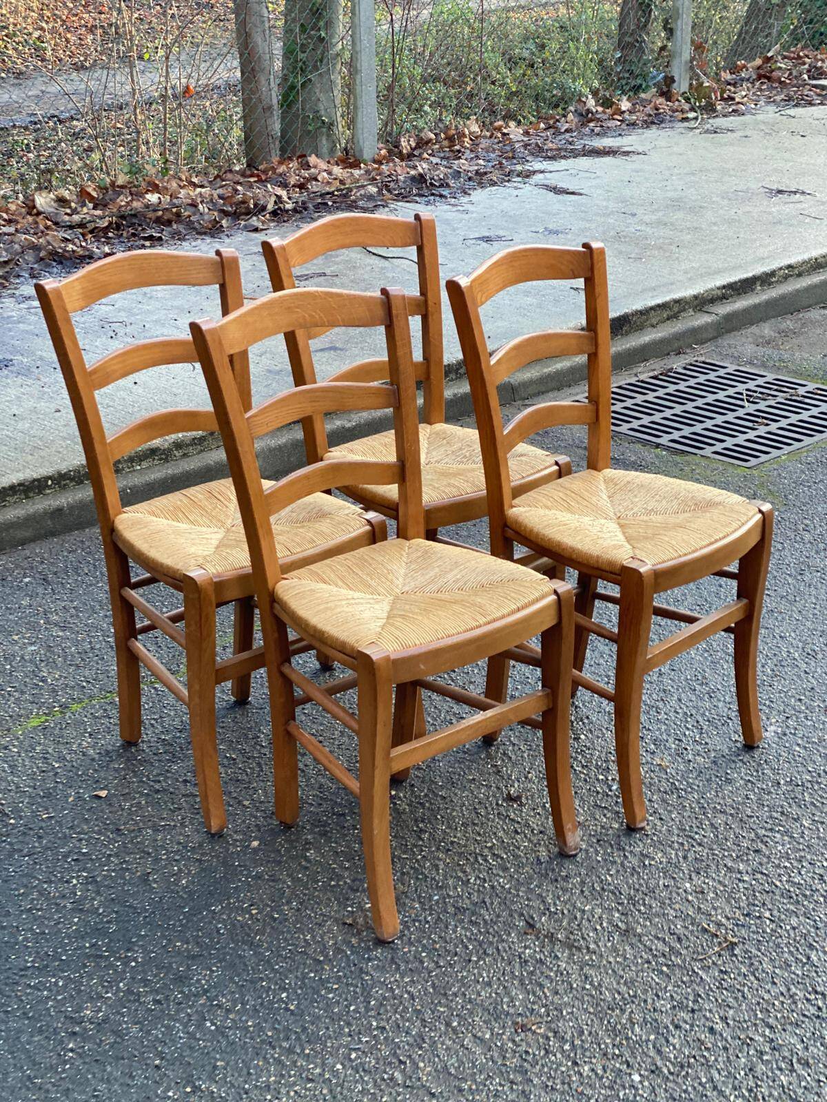 4 solid wood straw-seated Louis Philippe chairs, oak, 20th century.