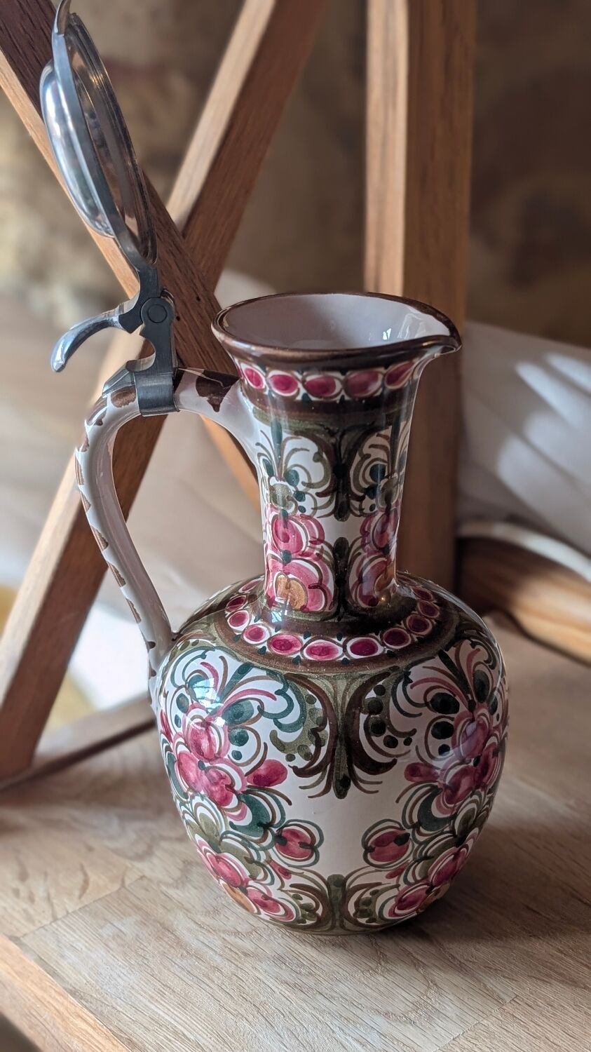 Antique hand-painted earthenware pitcher – Red and green floral decoration