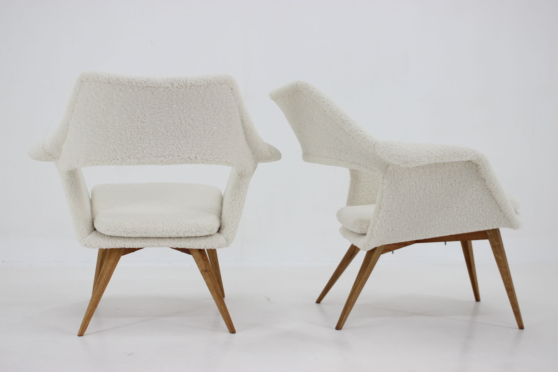 Pair of miroslav navratil shell lounge chairs in sheepskin fabric, czechoslovakia, 1960