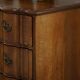 Antique baroque oak commode from the late 18th century with cabriole legs.
