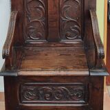 Neo-Gothic style cathedra armchair in carved oak