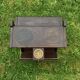Old Scandinavian style magazine rack in dark wood with integrated brass ashtray