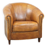 Fauteuil club en cuir de mouton patiné couleur cognac