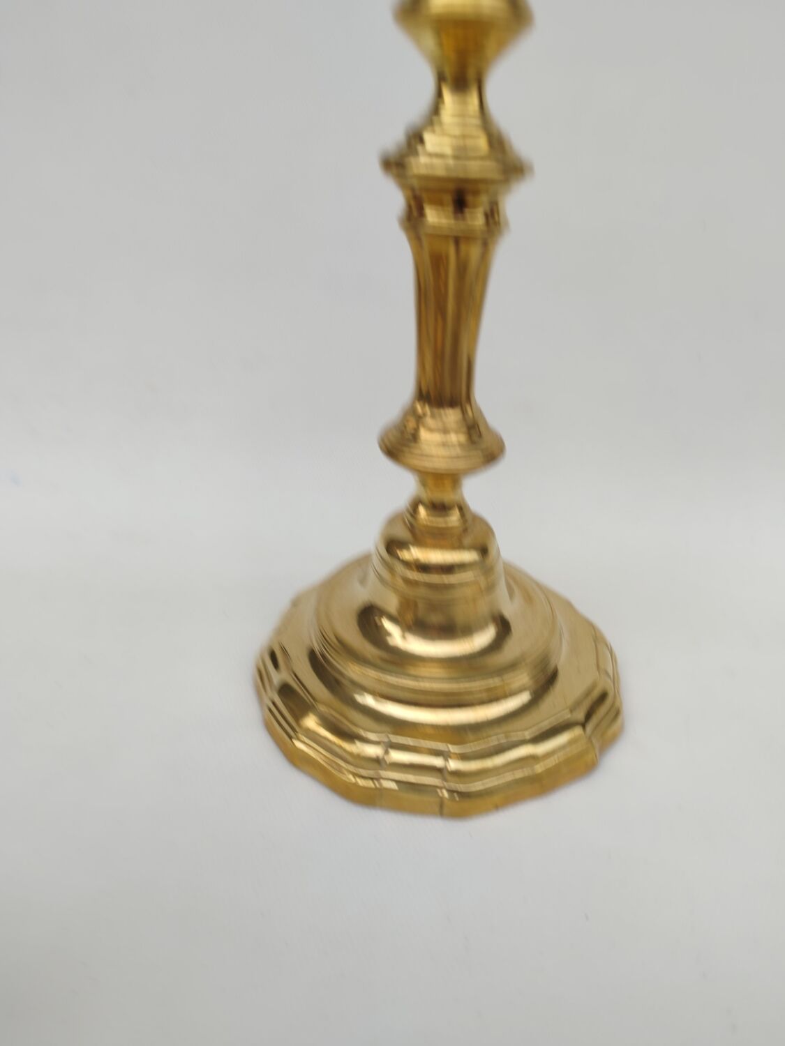 Pair of solid brass candlesticks, early 18th century.
