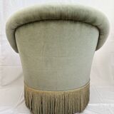 sage green toad armchairs with gold fringe