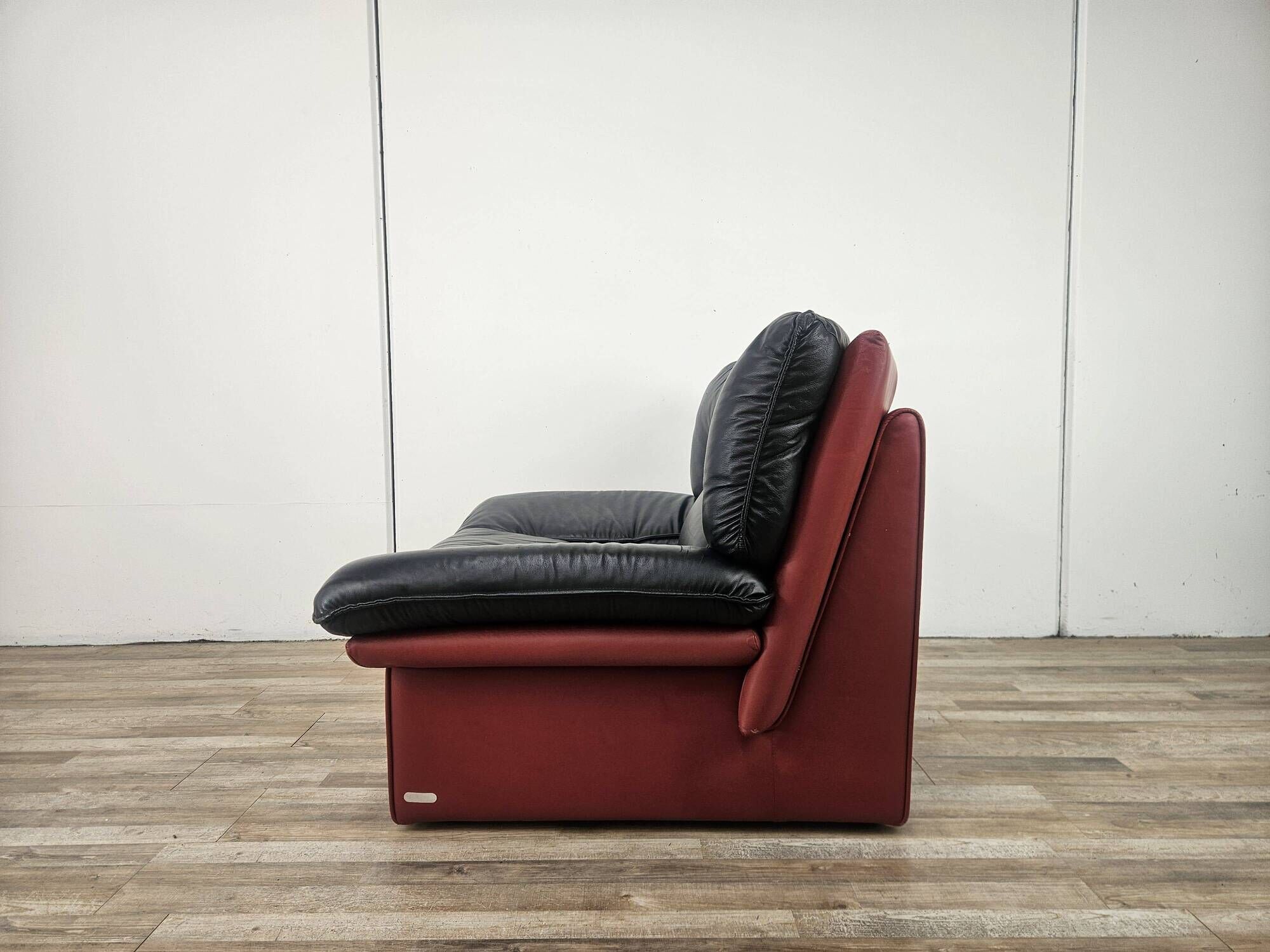 Red and black leather armchair by Nicoletti Salotti