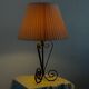 Vintage wrought iron table lamp in swirl shape with pleated shade