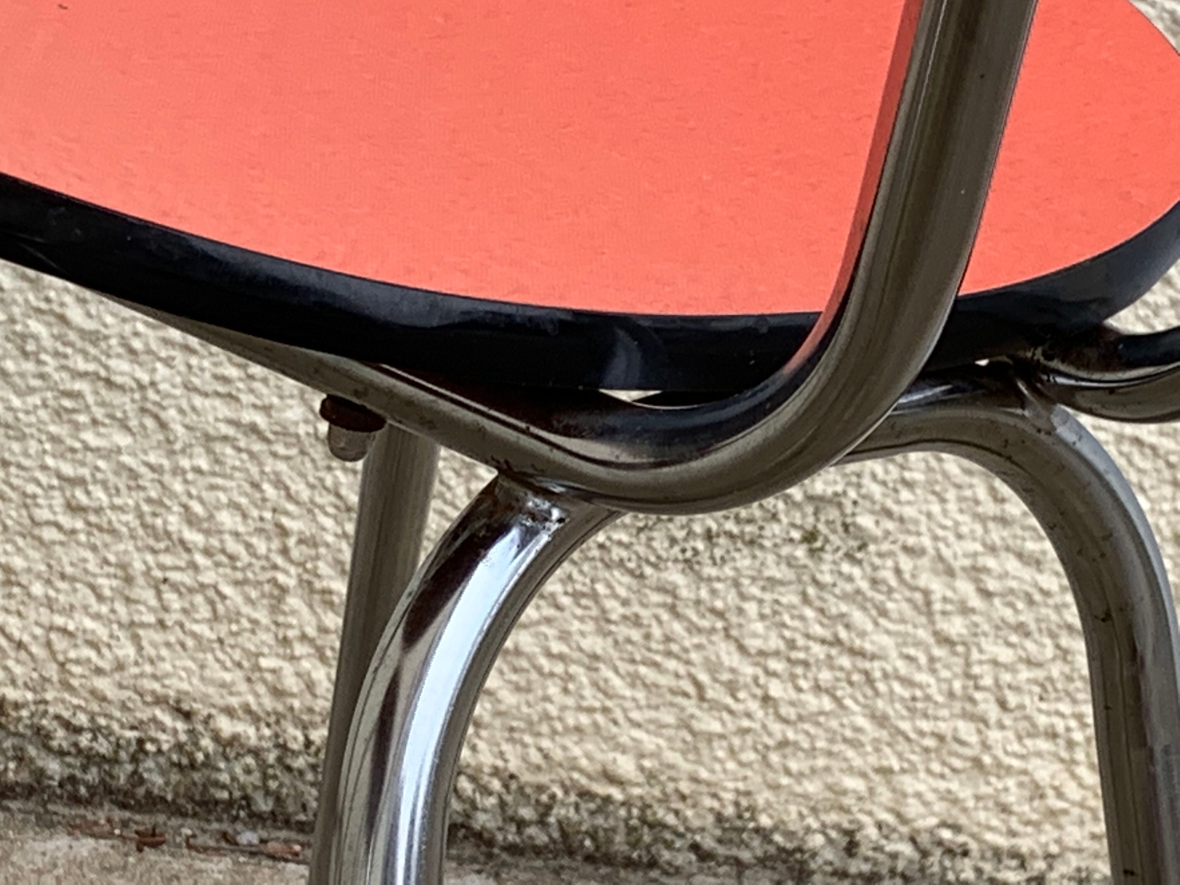 Red formica chairs 1950