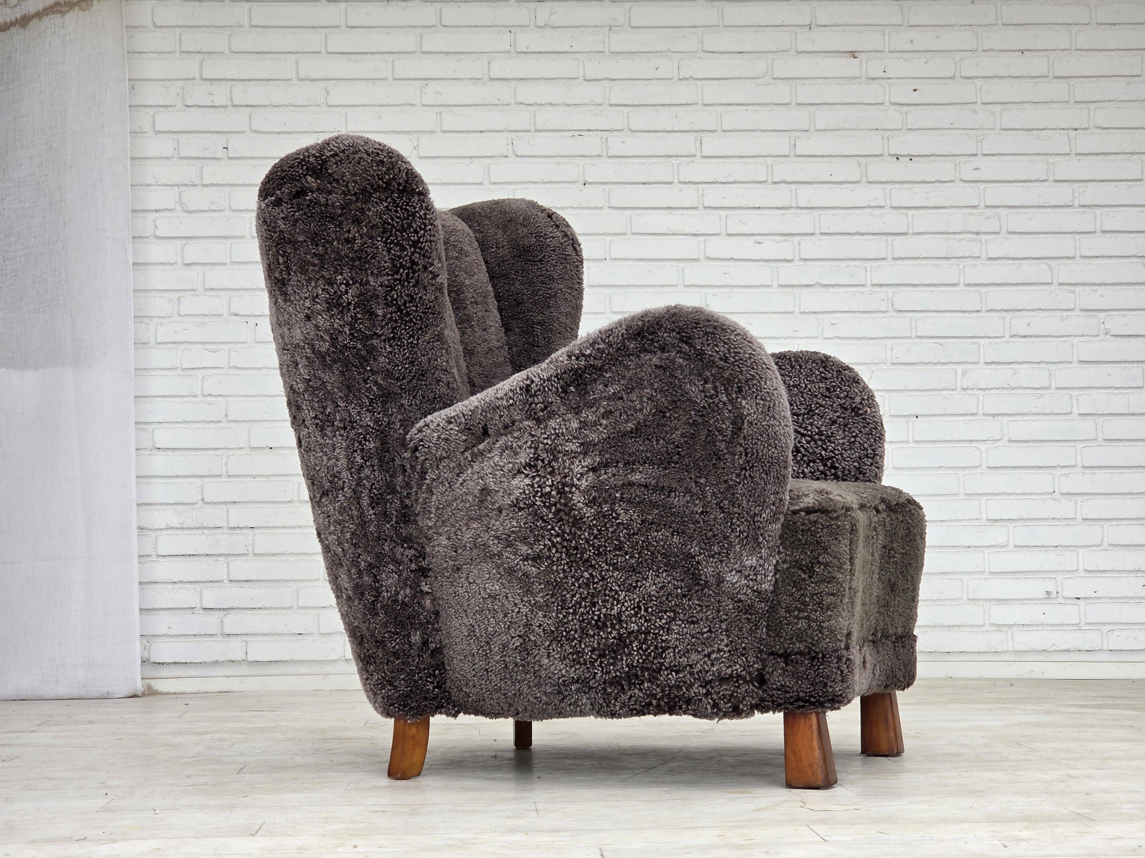 1960s, Danish design, reupholstered armchair, genuine sheepskin.