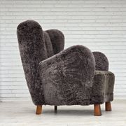 Années 1960, design danois, fauteuil rembourré, véritable peau de mouton.