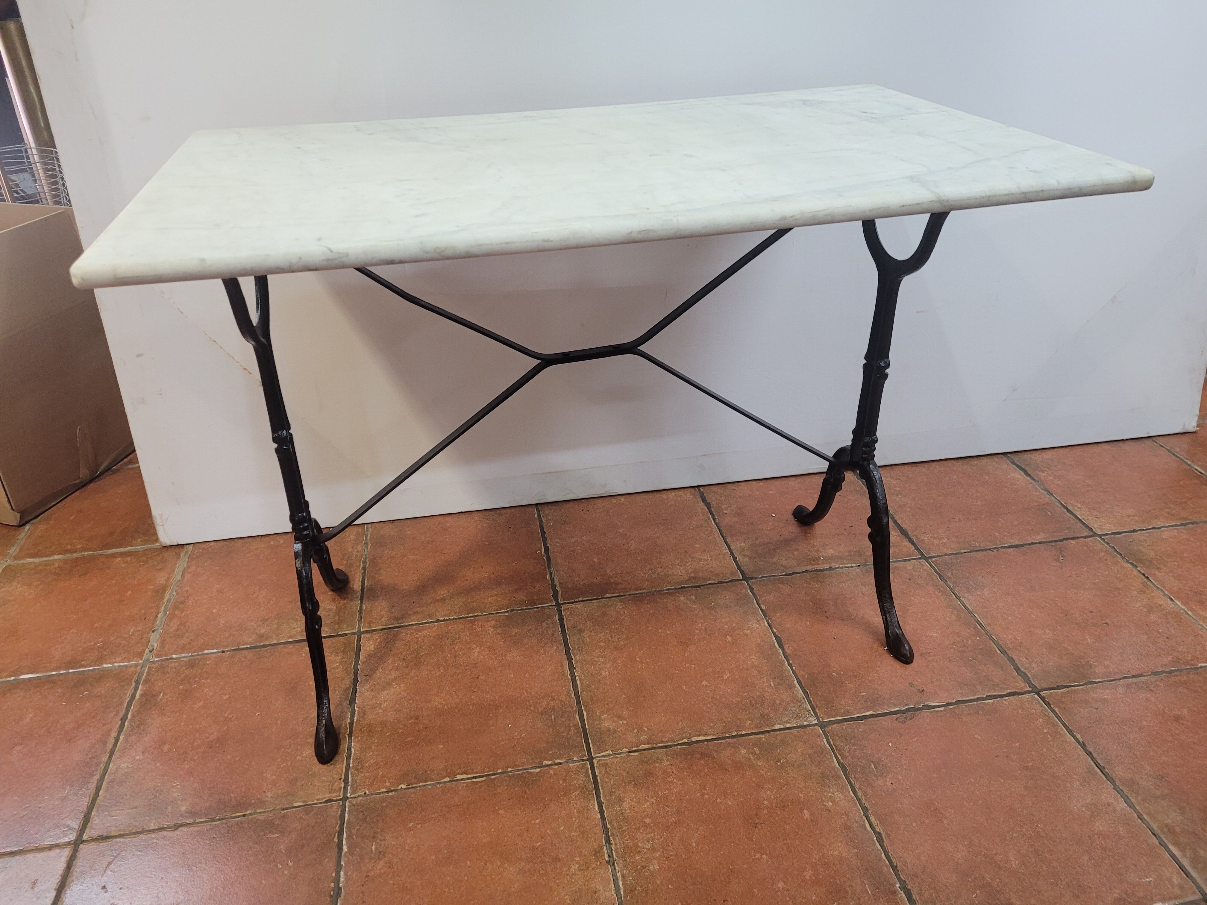 Bistro table base cast iron over marble