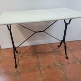 Table de bistrot piètement fonte dessus marbre