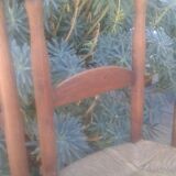 Set of five straw church chairs