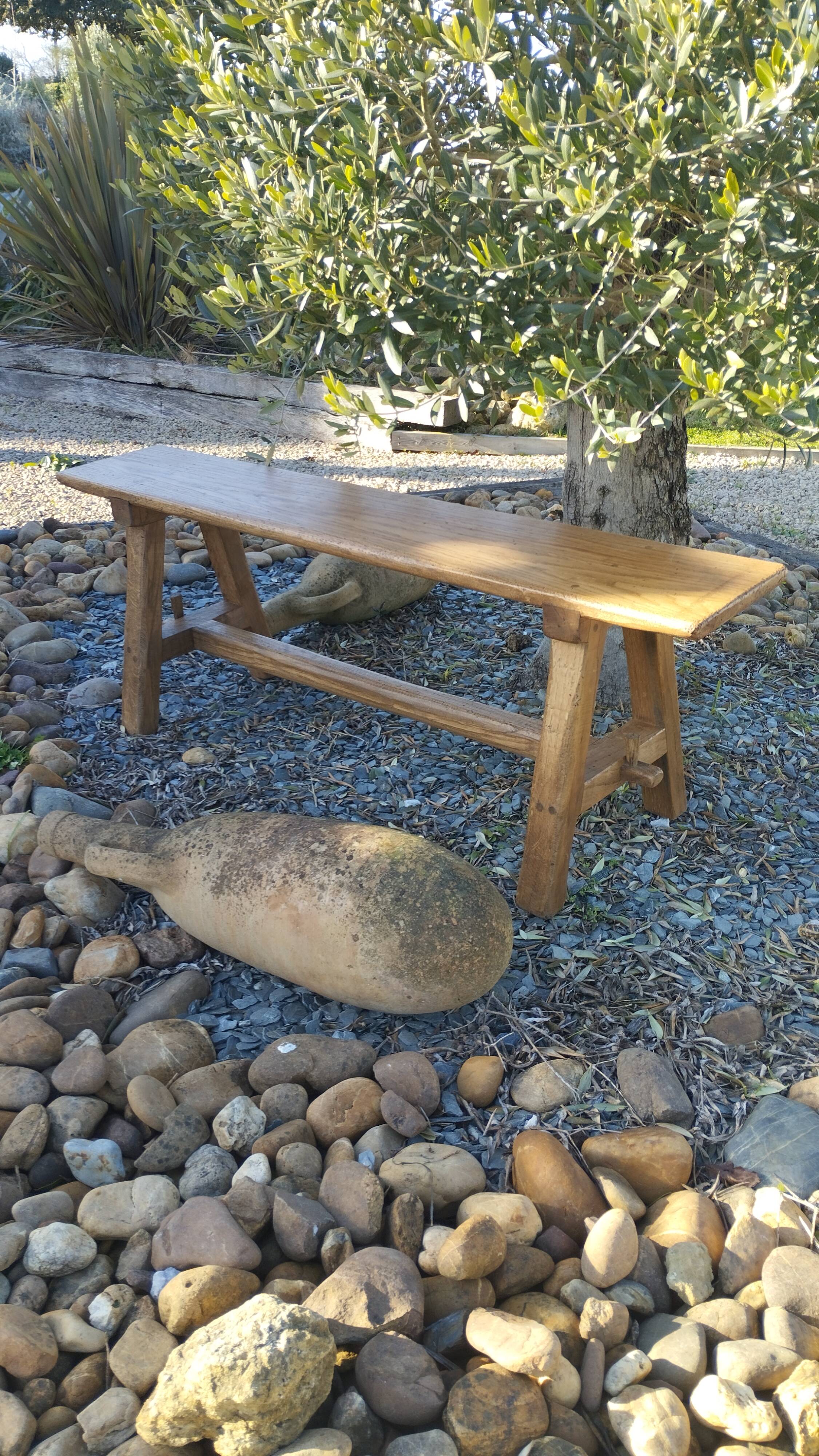 "A frame" bench in solid oak, patinated.