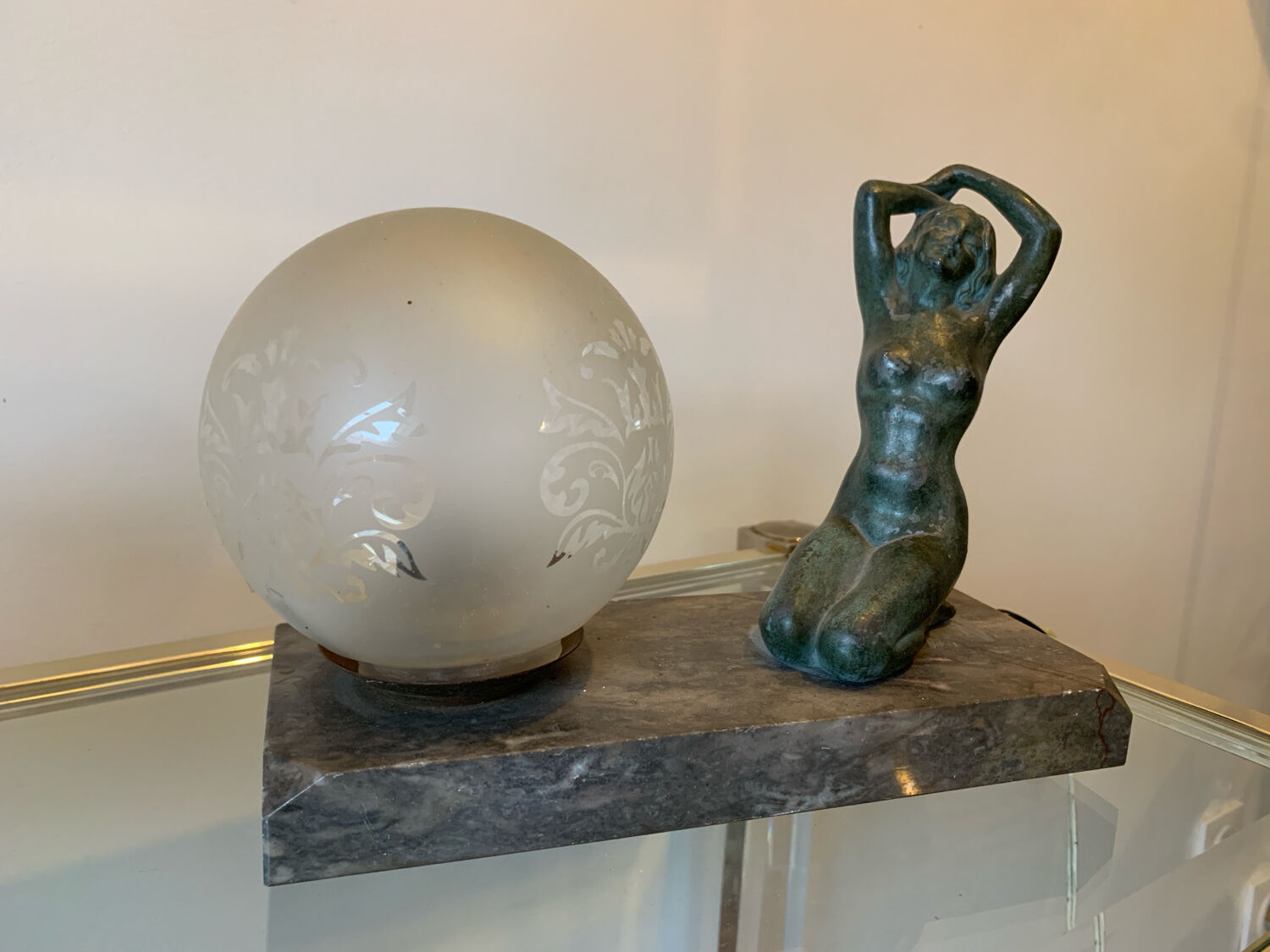 Art Deco lamp with woman and opaline globe on marble