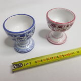 Pair of hand-decorated blue and garnet cockroaches signed "Siena Italy"