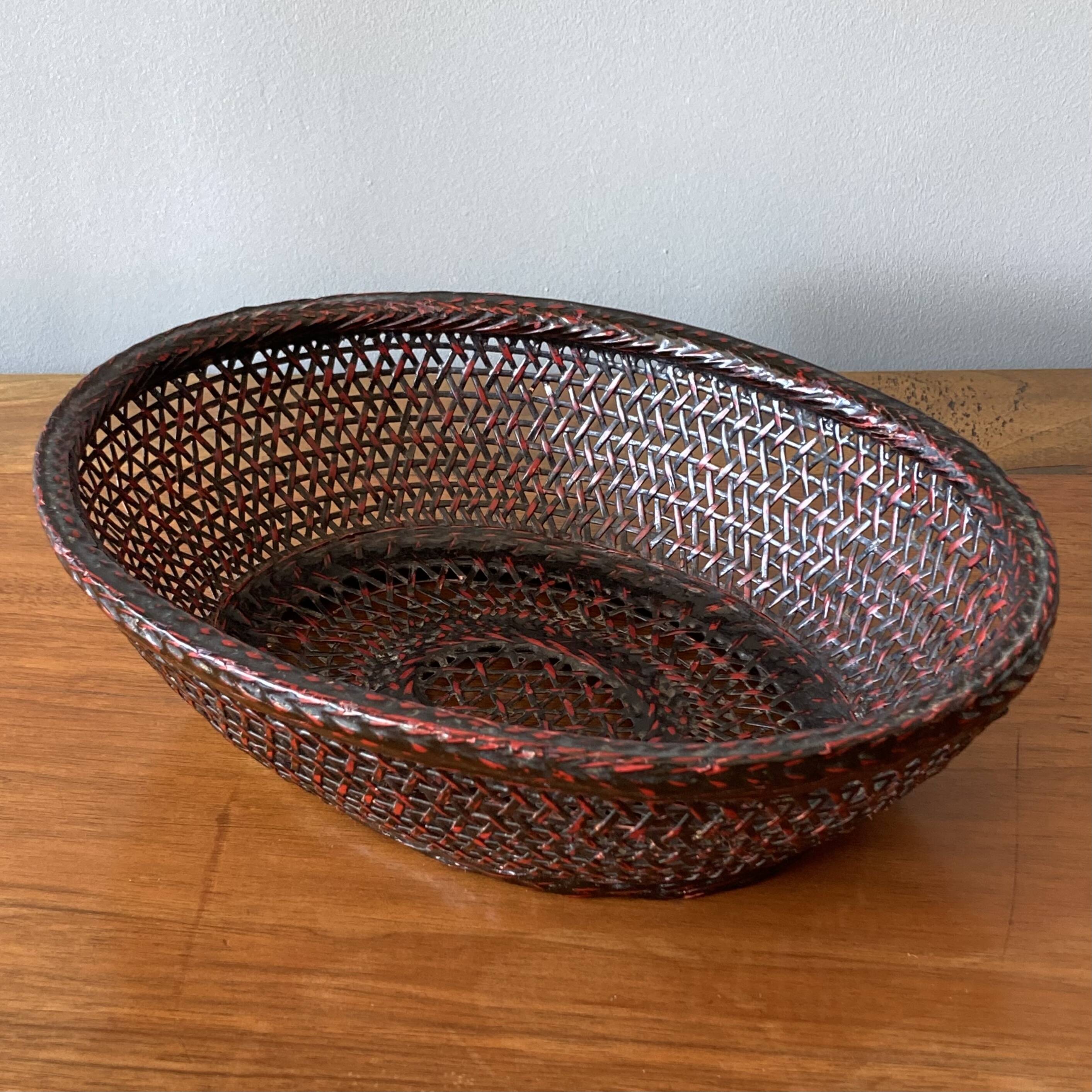 Japanese oval basket in negoro lacquered basketry (red lacquer on black background)