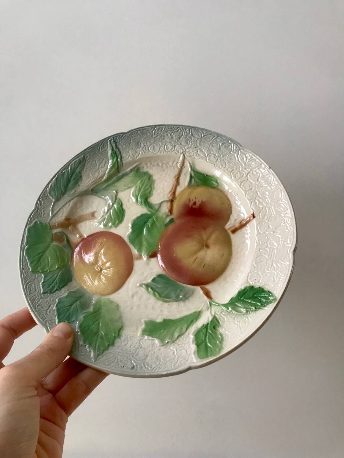 Trio of St Clement dessert plates in 19th century slip