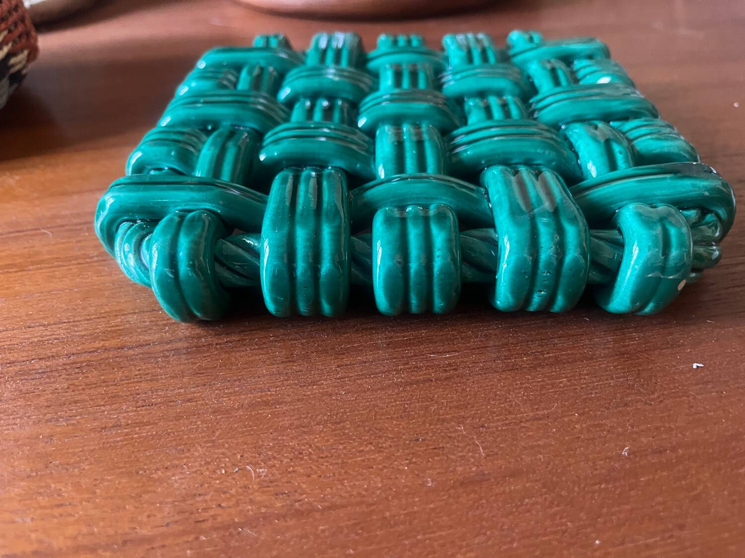 Woven ceramic trivet
