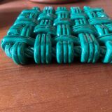 Woven ceramic trivet
