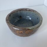 Stoneware empty pocket bowl with stylized floral decoration