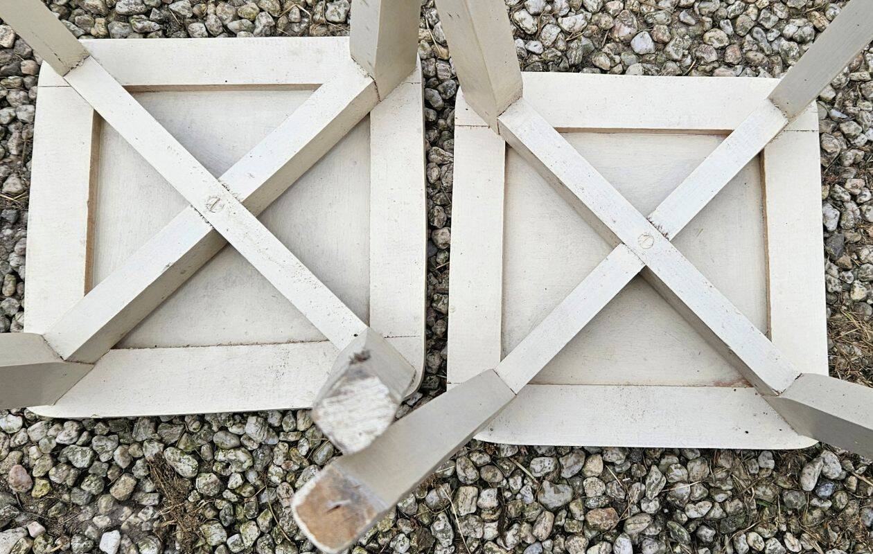 2 white painted wooden stools with compass legs