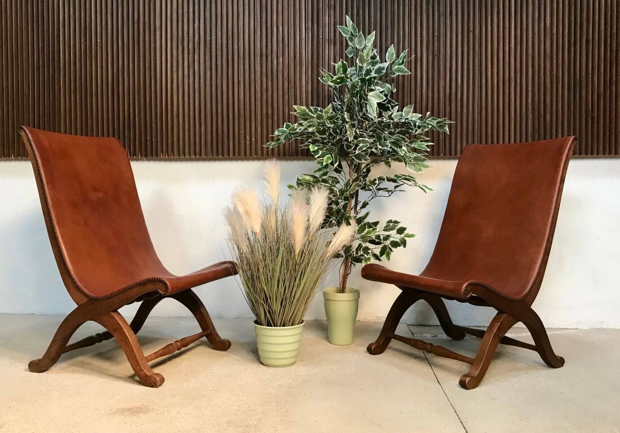 Set of 2 Spanish high-back leather slipper chairs by Pierre Lottier, 1950s