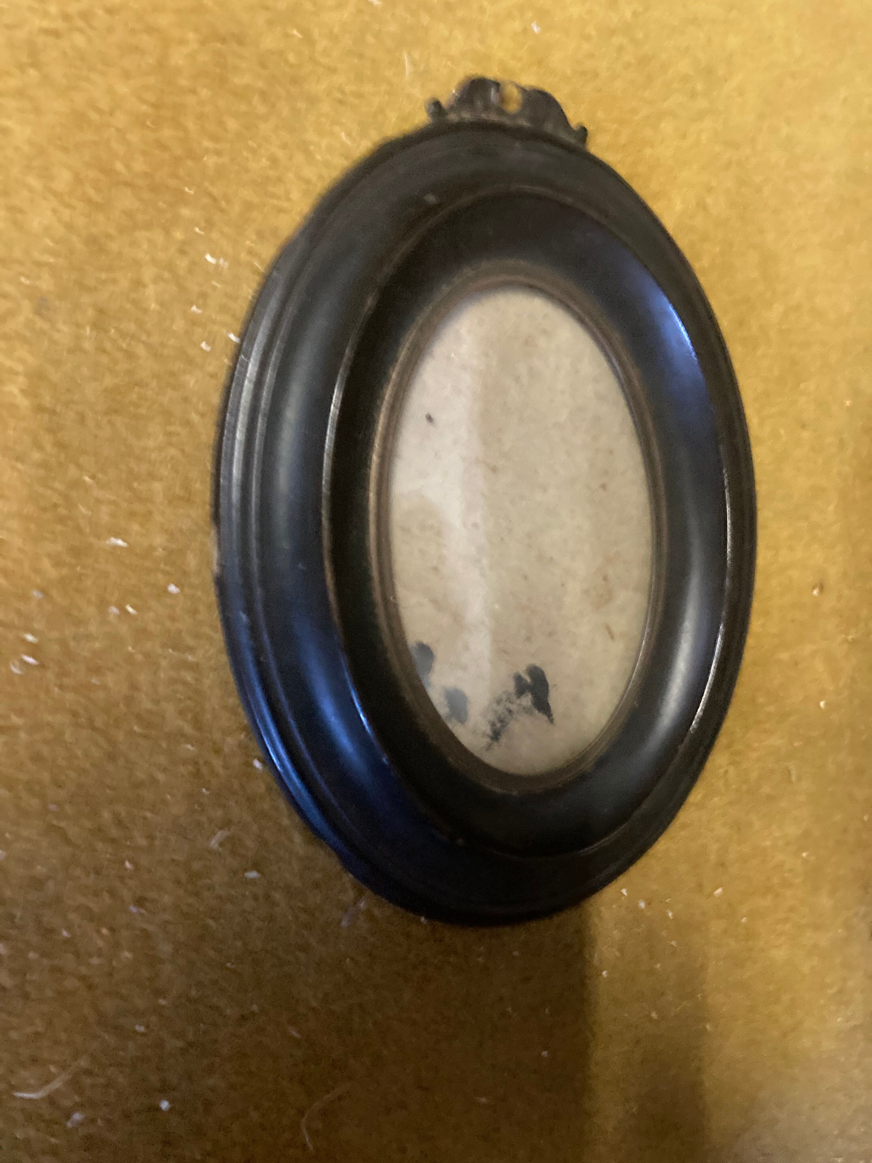 Blackened brass Nap III frame.