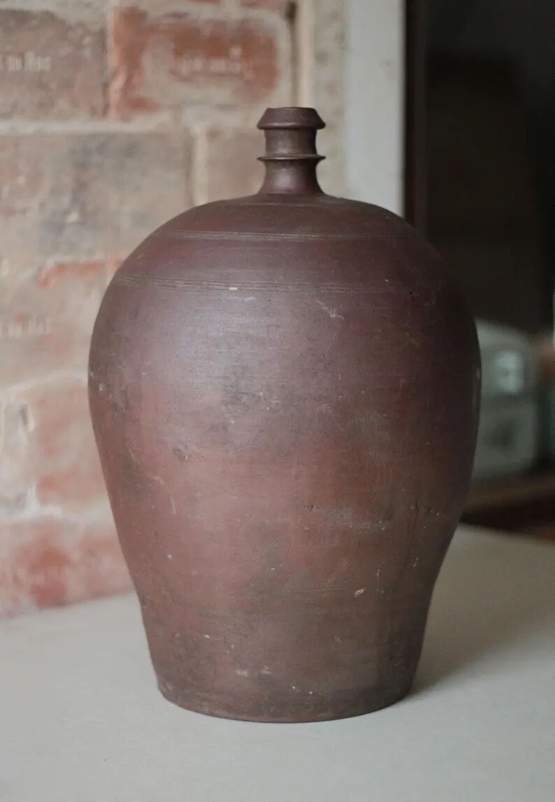 Old handled pot, antique pot, handled jar, interior decoration, collection, pottery.