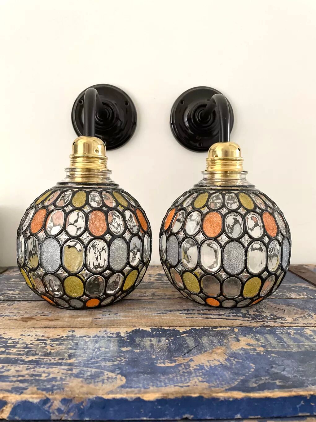 Pair of vintage faceted glass wall lamps