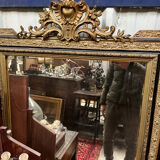 Large antique gilt mirror with scroll and shell decoration, 144 cm
