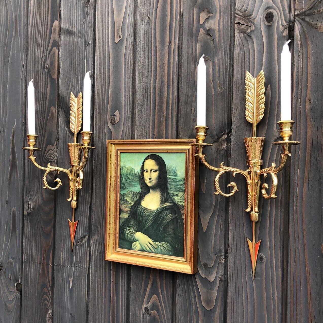 Pair of wall lamps decorated with bronze arrows "Cupid"