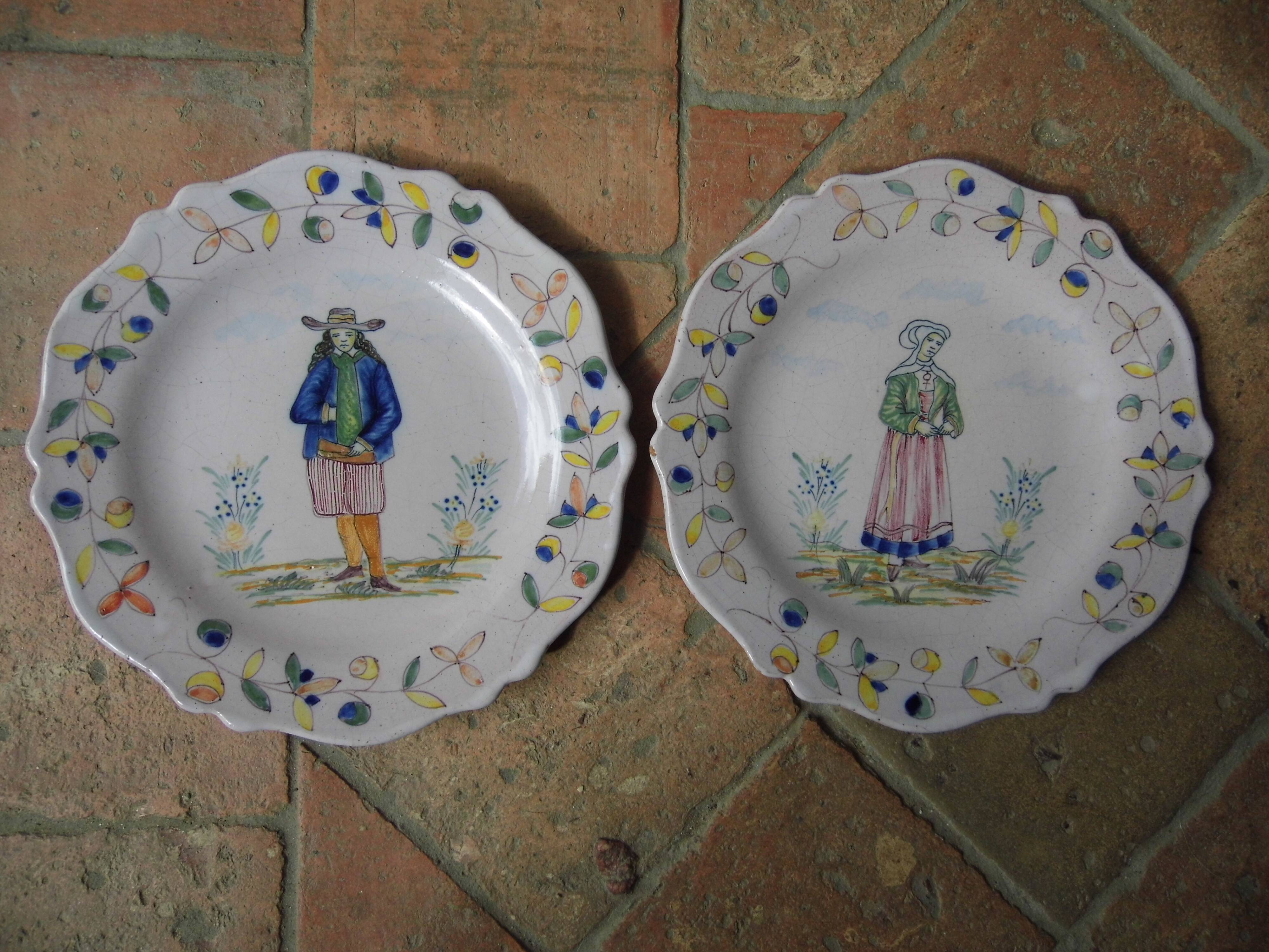 Malicorne earthenware plates, late nineteenth century, Breton décor.