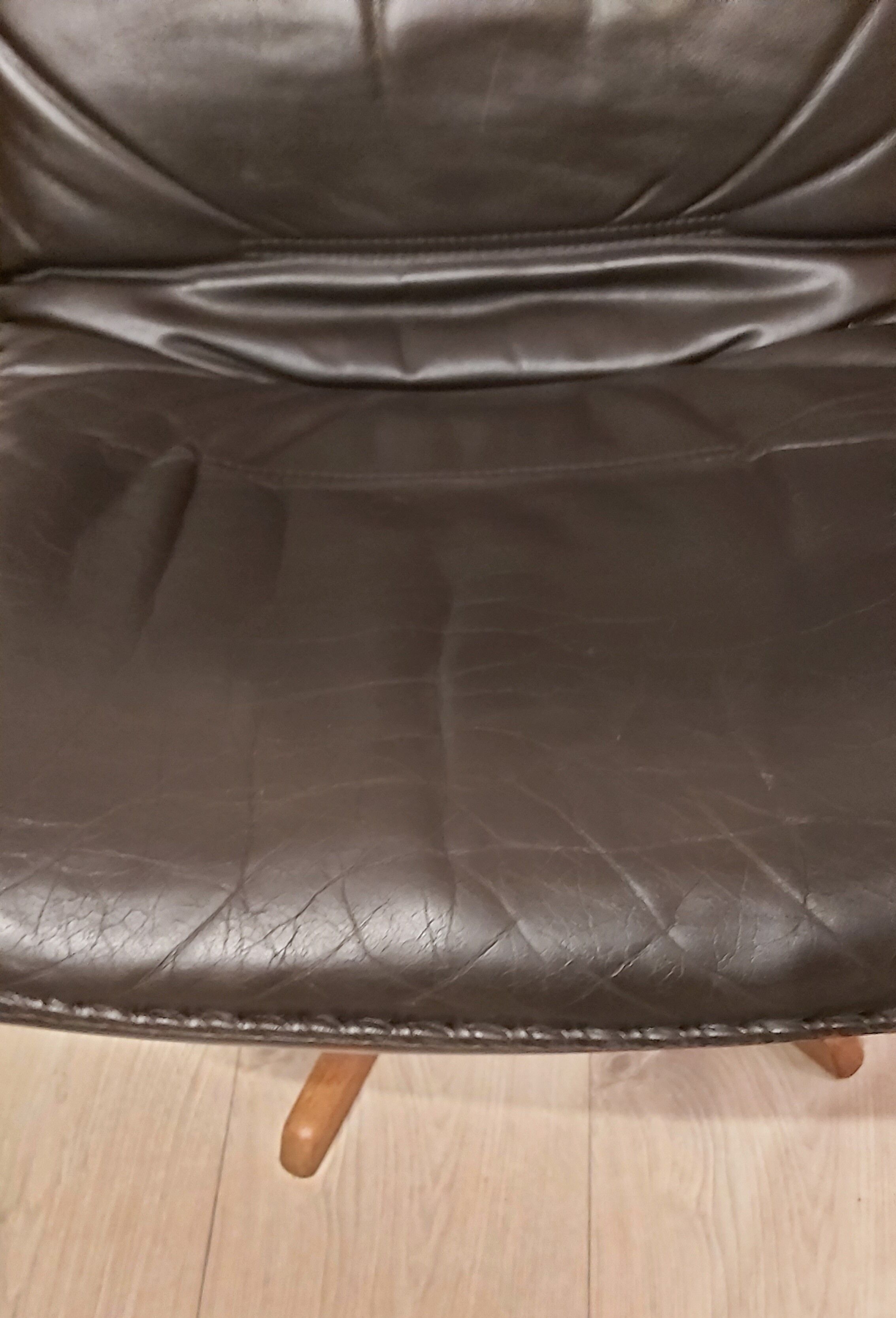 Swivel armchair with footrest, Berg Forniture, Denmark, 1970s