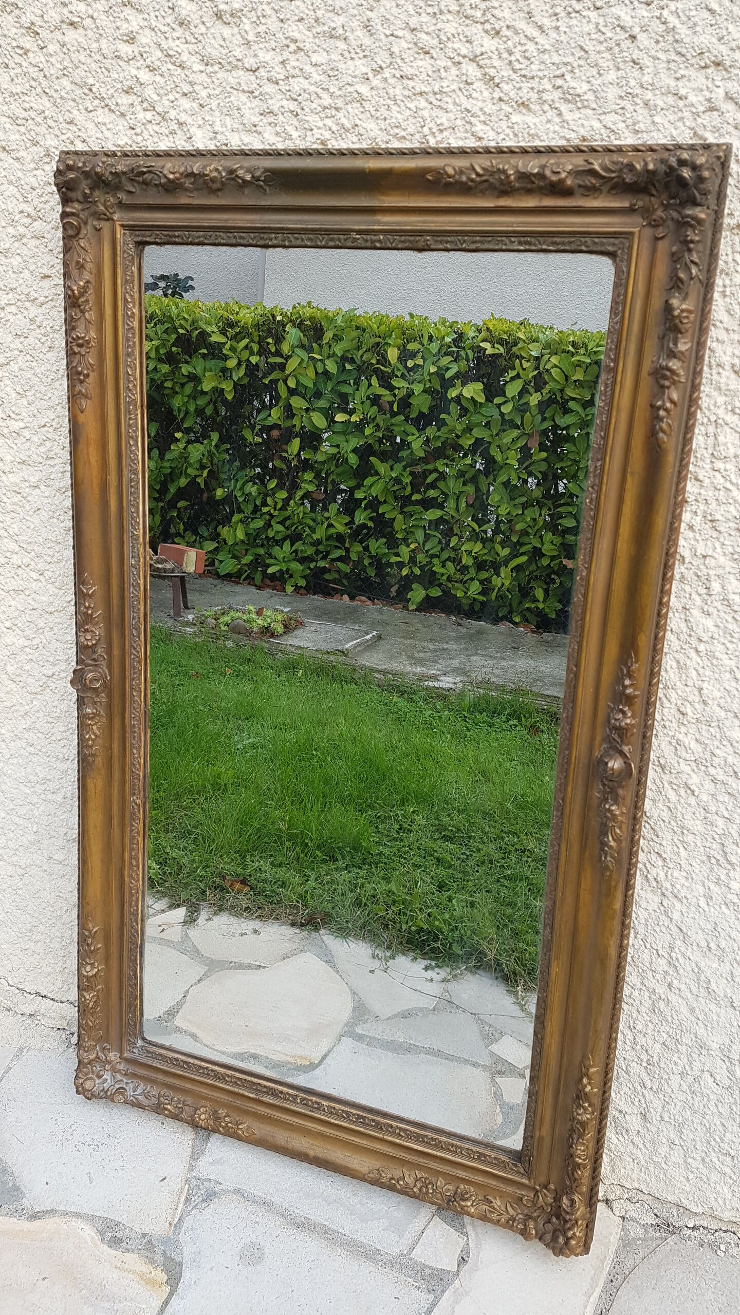 Wood mirror and gilded stucco, 19th, 124x73 cm