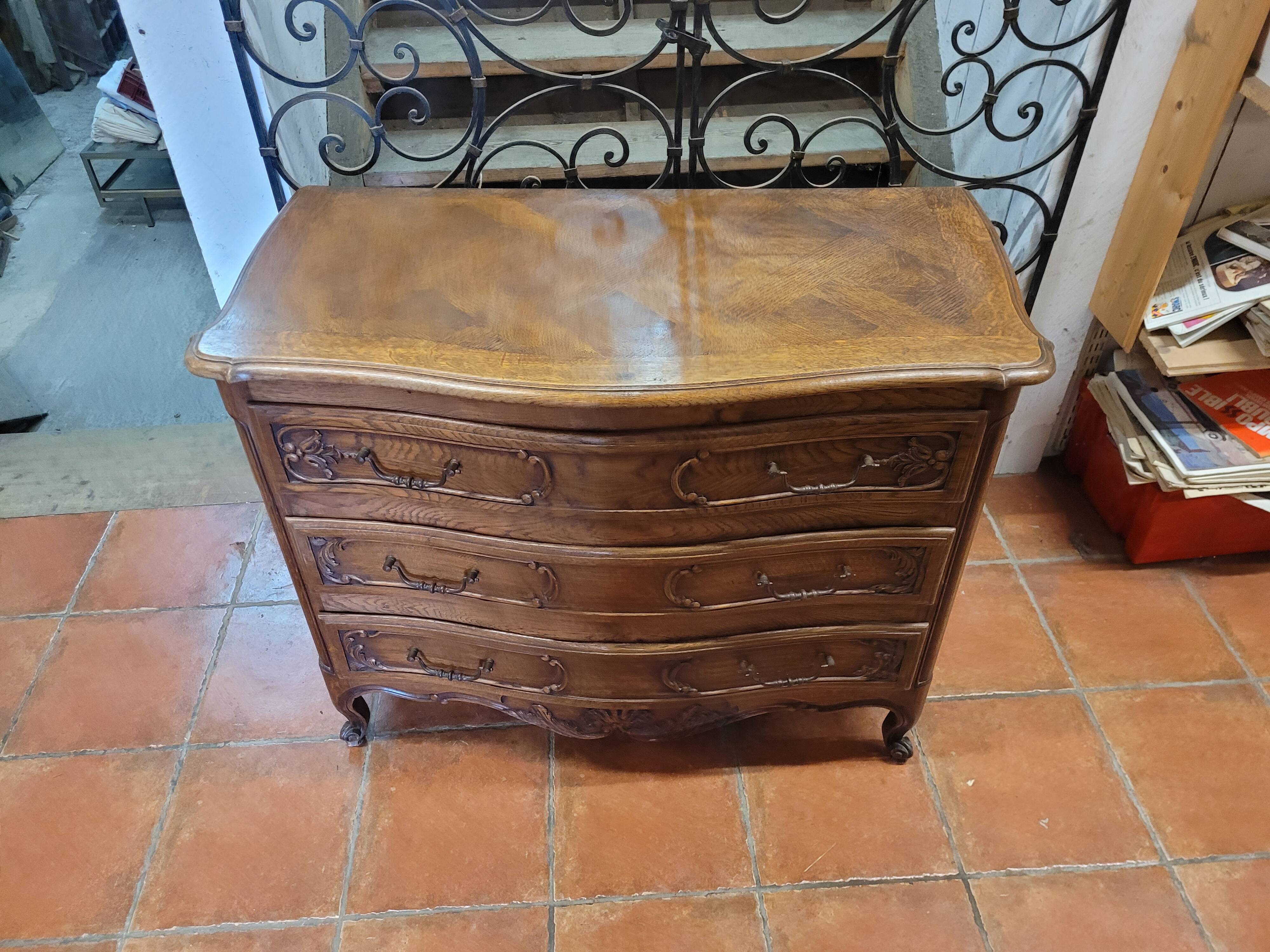 Curved oak chest of drawers in Louis XV style