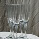 Set of 5 glass champagne flutes with twisted ribbed base
