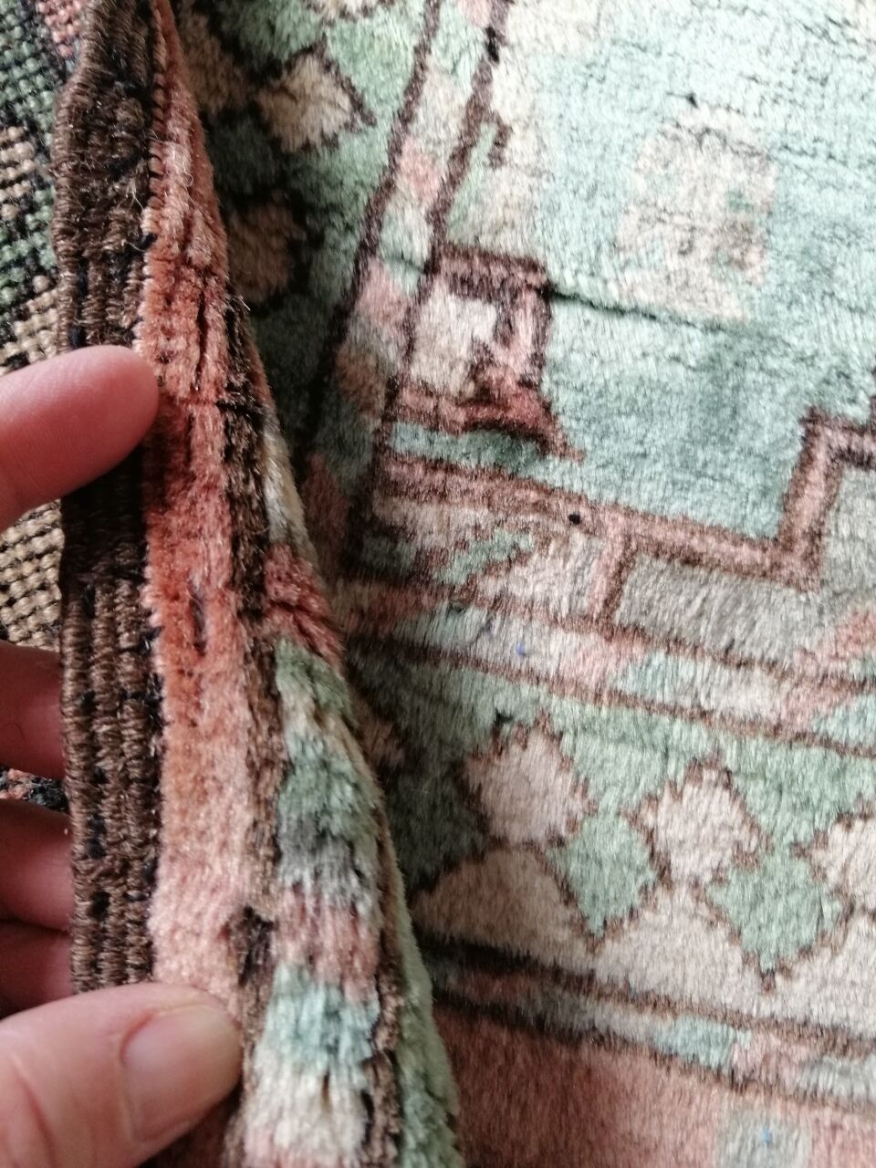 Afghan rug in pastel colors