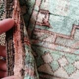 Afghan rug in pastel colors