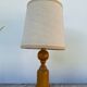 Old turned wooden lamp