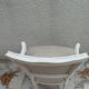 Louis XV style armchair in patinated beige, upholstered in beige fabric.