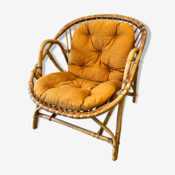 Rattan basket armchair with its cushion
