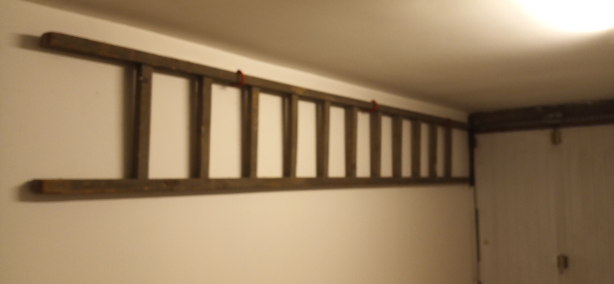 Old wooden flat roof ladder
