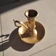 Brass table candle holder with candle push system