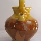 E-mailed terracotta jug or kid.