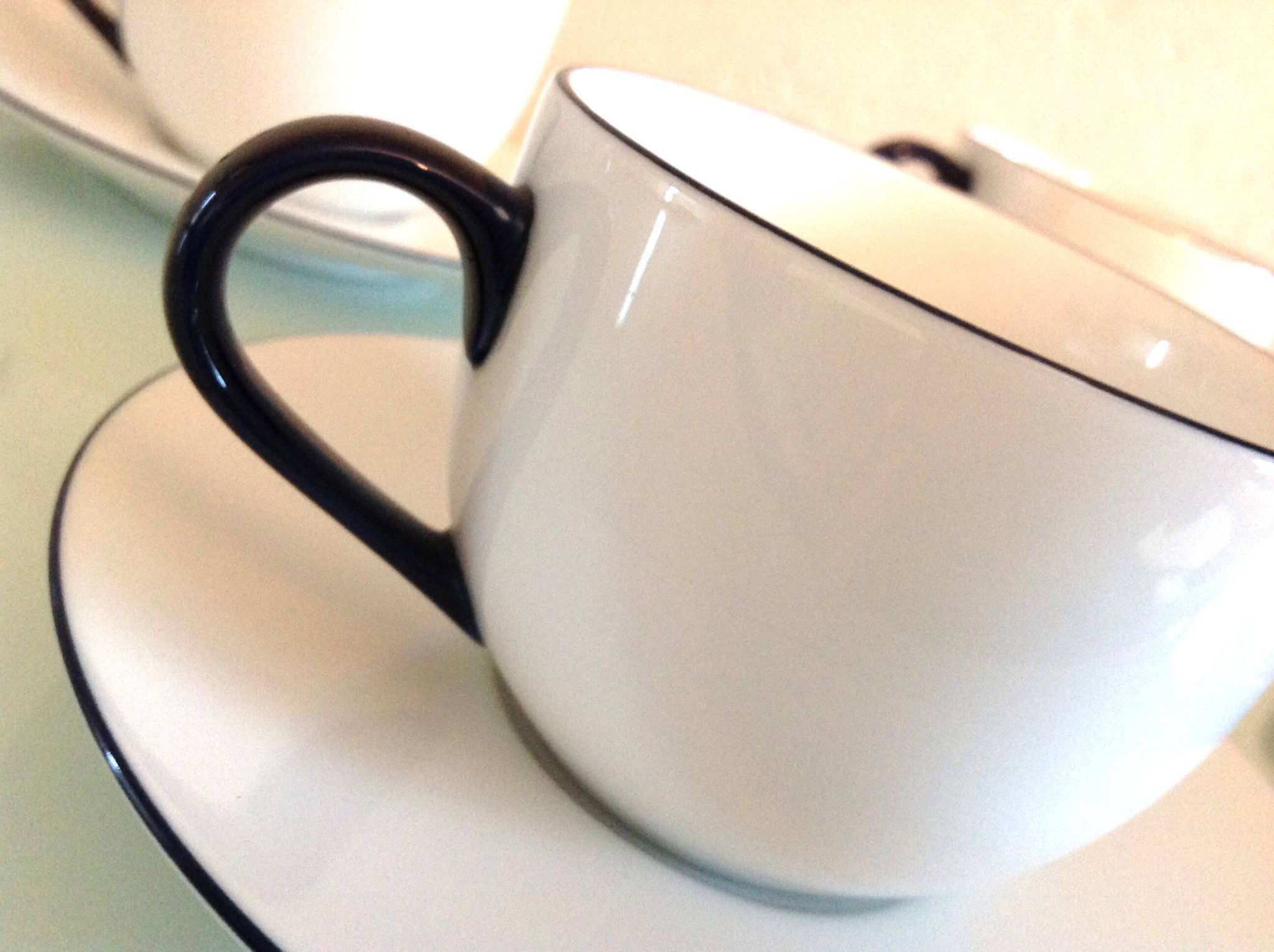 Set of eight white porcelain cups with blue edging / vintage 70s-80s