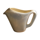 Light blue pitcher in vintage earthenware